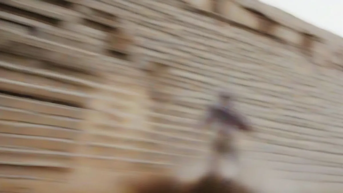Monu Meturbala running along a highway during his pilgrimage.