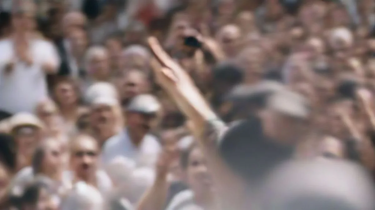 Brazilian President Luiz Inacio Lula da Silva campaigning outdoors surrounded by supporters