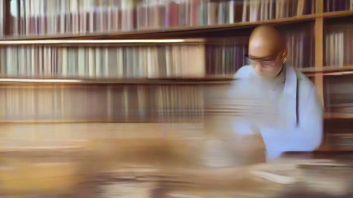 A student studying at a desk preparing for management entrance exams