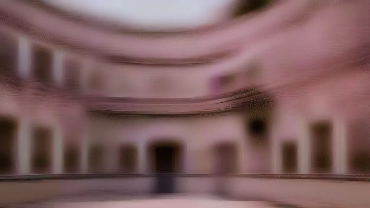 Exterior view of Bikaner House in New Delhi at dusk.
