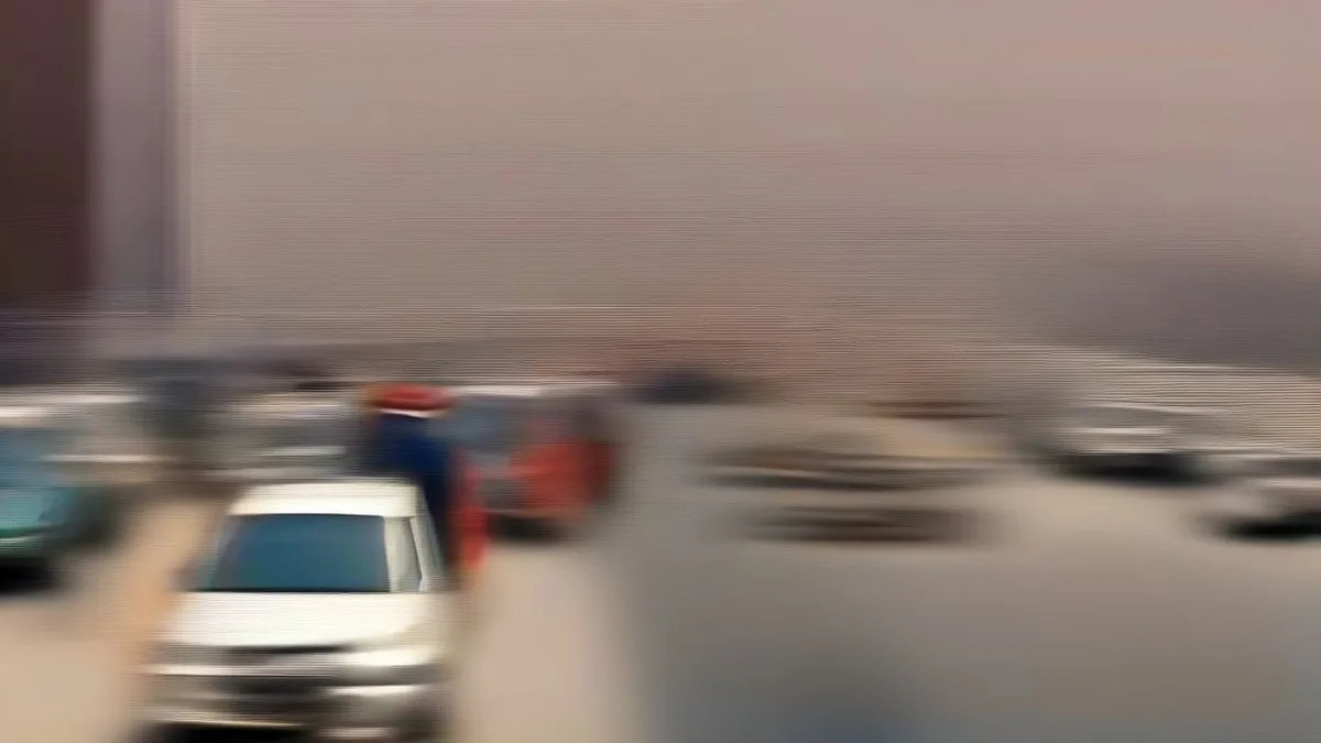 Traffic congestion and police officers managing diverted vehicles near a closed flyover in Delhi.