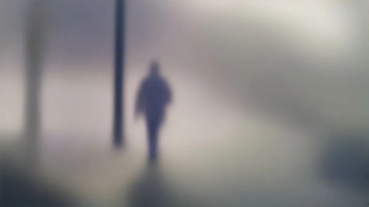 People walking in New Delhi on a cool October morning wearing light jackets