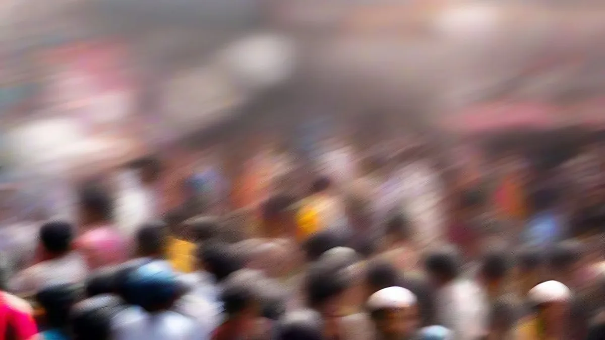Bustling Delhi market street crowded with shoppers during festival season
