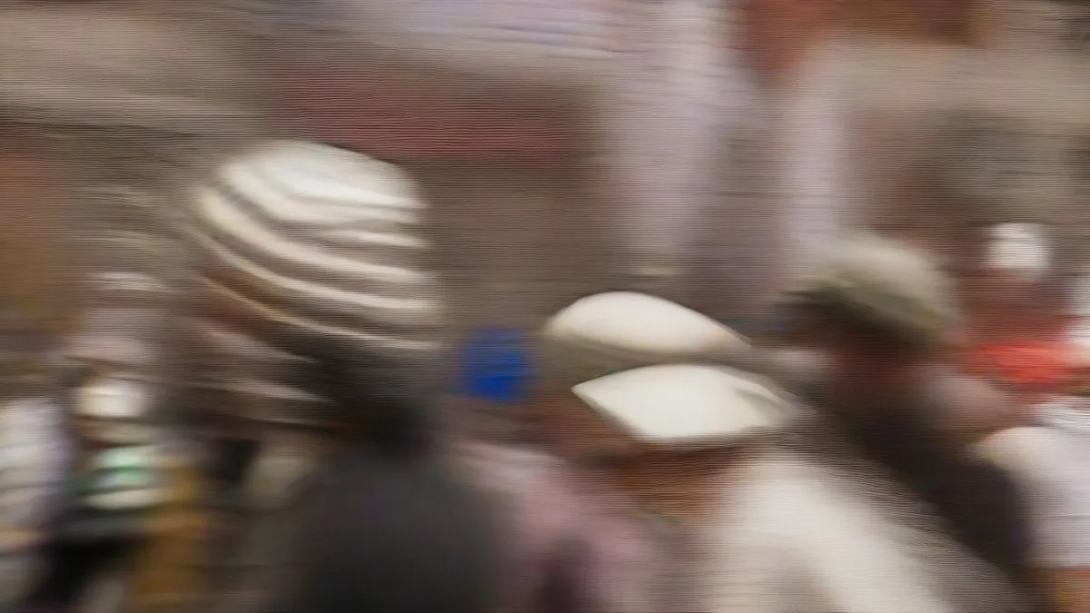 Busy shoppers and market vendors in Chandni Chowk during the festive shopping season in Delhi.