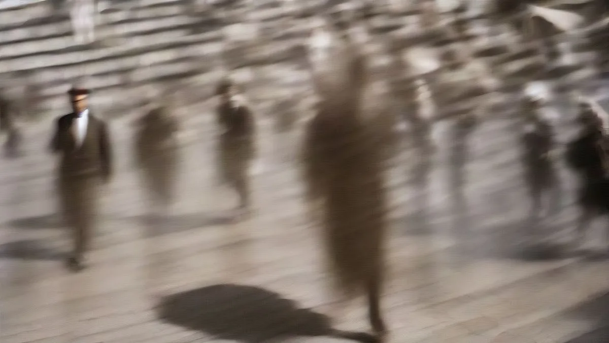 Pedestrians walking through a scorching public square during Europe's extreme heat wave.