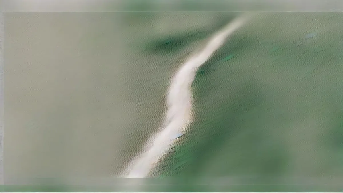 A turbulent muddy river rushing through a mountain valley after a glacial lake outburst.