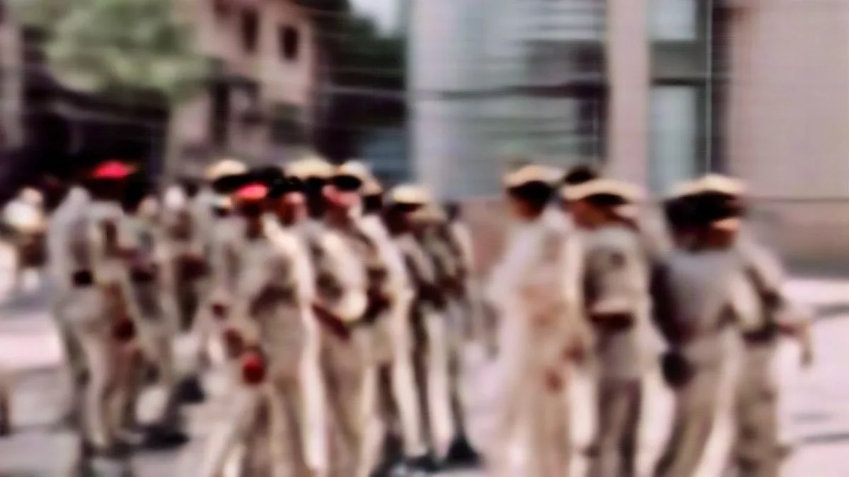Police officers standing outside a police station in Hyderabad during an investigation.