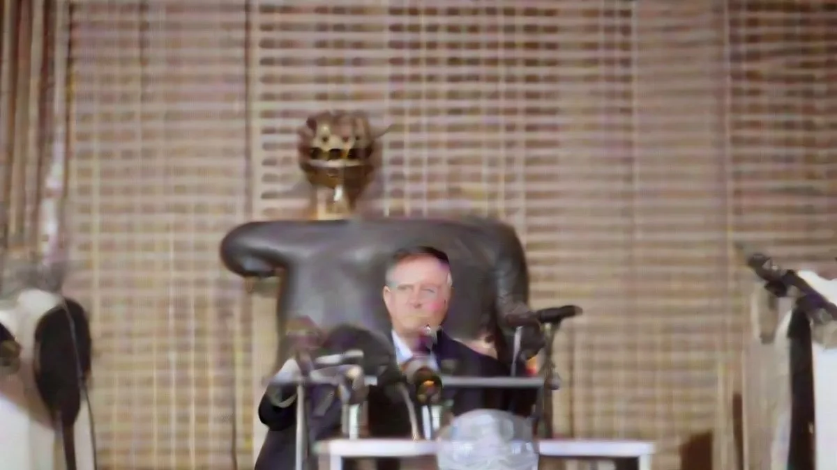 Gadi Eisenkot speaking at a press podium during post-election briefings.