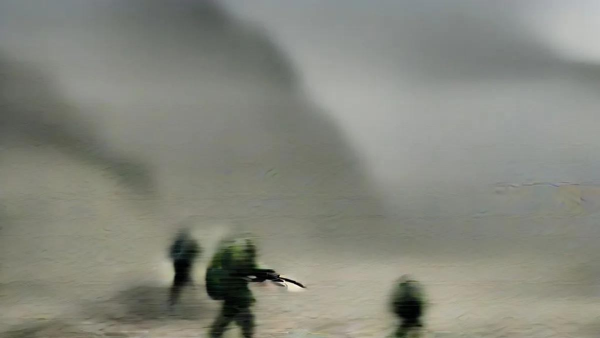ITBP personnel patrolling a high-altitude mountain ridge along the border.