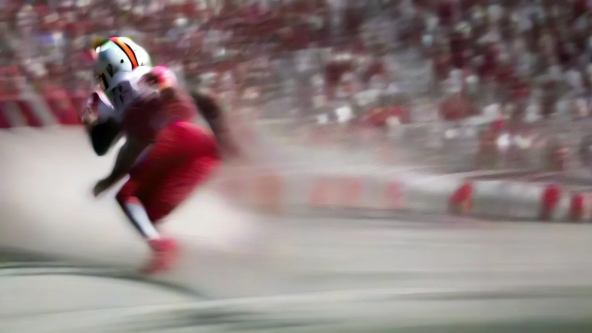 Kenneth Walker III in a Kansas City Chiefs uniform carrying the football during an NFL game
