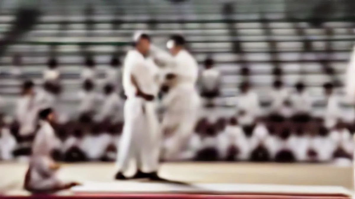 Manipur Chief Minister receiving Grand Master Taekwondo distinction at indoor stadium