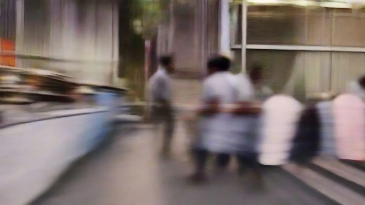 A street scene in Katraj, Pune, where police are investigating a crime scene.