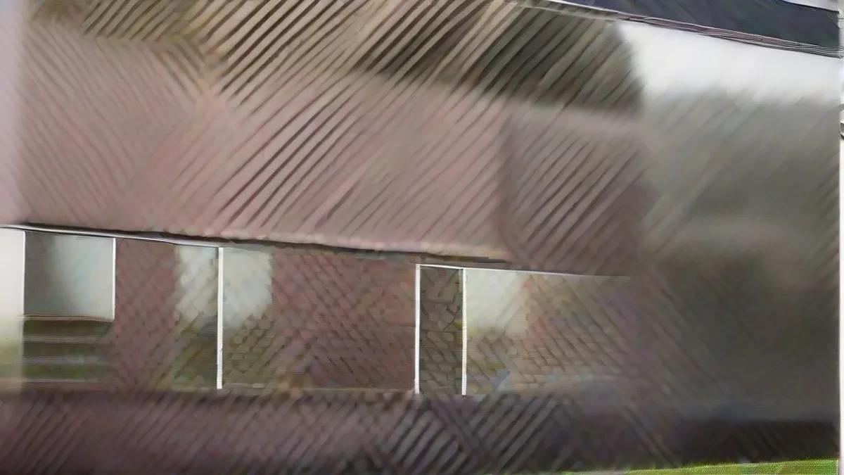 Exterior view of an American school building representing the institution facing legal action.